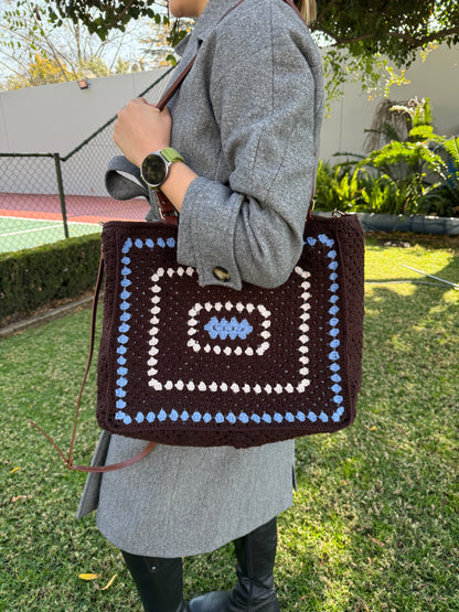 Handmade crochet tote bag styled with book for cozy everyday use