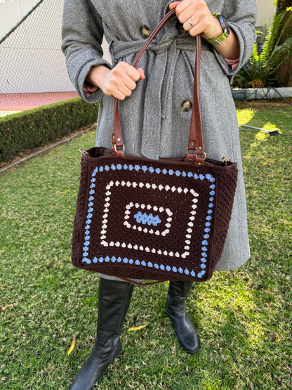 Large crochet shoulder bag styled with grey coat for everyday use