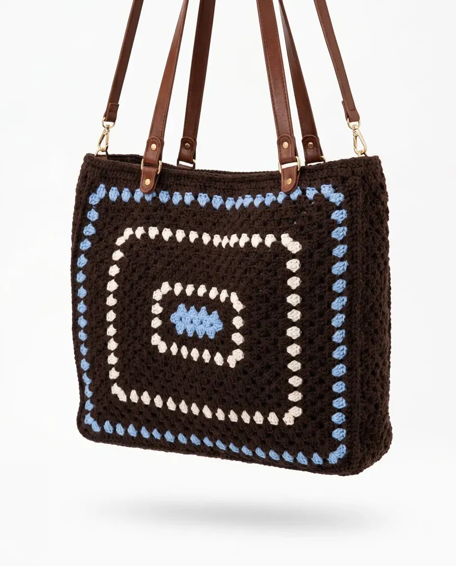 Brown and blue crochet tote bag with structured shape and spacious design