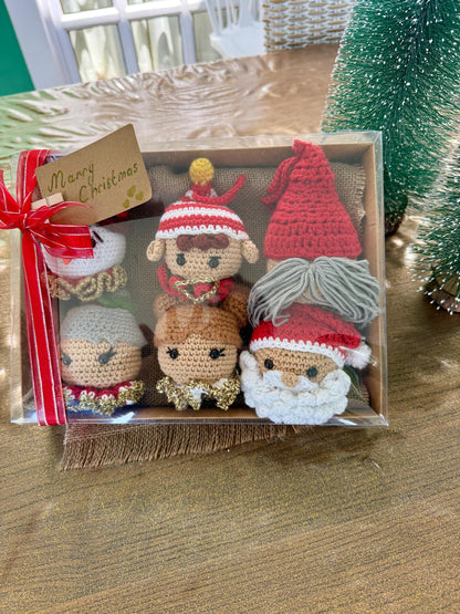 Handmade crochet ornament set presented in a gift box with personalized note option – holiday baubles.